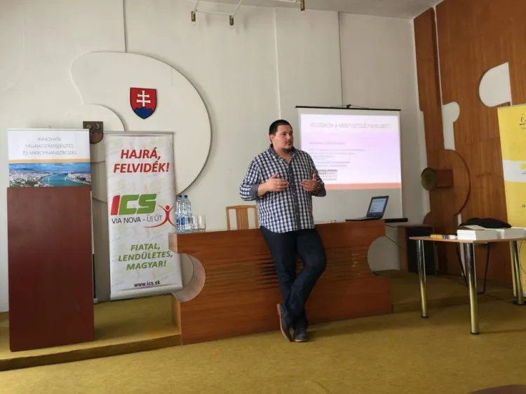 a man is giving a lecture