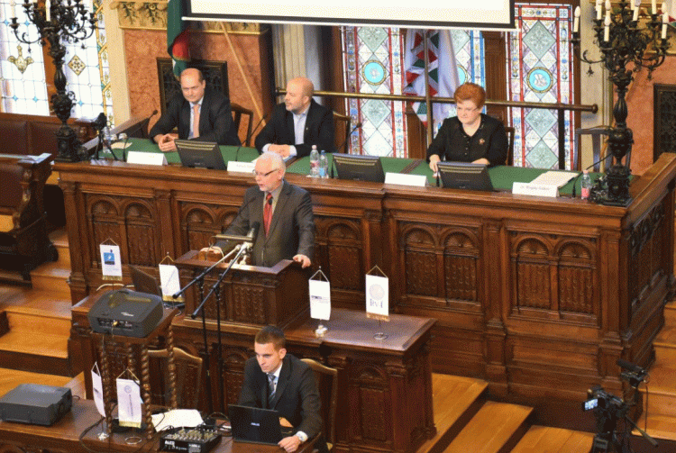 government people giving a talk inside the parliament